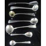 A collection of seven various Georgian and other silver salt and mustard spoons,