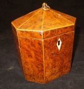 A George III burr yew and boxwood strung tea caddy of pagoda form,