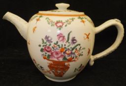 A late 18th / early 19th Century Chinese polychrome decorated teapot with floral spray and vases of