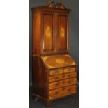 An early 19th Century mahogany bureau bookcase,
