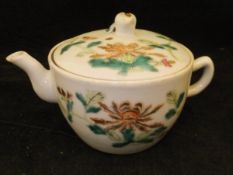 A Chinese famille rose teapot and cover, or Saki pot,