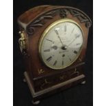 A circa 1835 flamed mahogany brass inlaid bracket alarm clock, the dial marked "Walsh, Market Place,