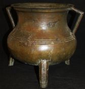 An 18th Century Chinese bronze censer of cauldron form,