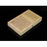 An early 20th Century Chinese pierced ivory card case, 8.3 cm x 5.