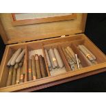 A Hunters & Frankau mahogany humidor and contents of thirty-five assorted cigars including one in a