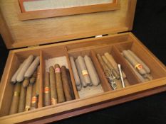 A Hunters & Frankau mahogany humidor and contents of thirty-five assorted cigars including one in a