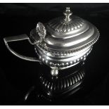 A George III silver lidded mustard of rectangular bellied form with semi-reeded decoration and