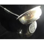 An 18th Century silver punch ladle,