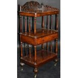 A Victorian rosewood whatnot,