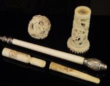 A 19th Century Chinese carved ivory puzzle ball, two carved ivory cheroot holders,