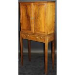 An early 19th Century flamed mahogany collector's cabinet,