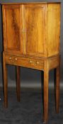 An early 19th Century flamed mahogany collector's cabinet,