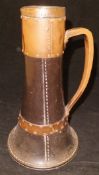 A Victorian Doulton Lambeth silicone jug of simulated leather form with studded plated copper