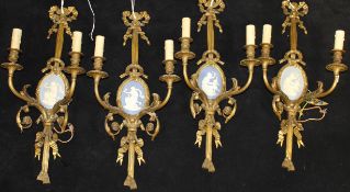 Two pairs of Louis XVI style brass twin branch wall light sconces set with blue Wedgwood Jasper