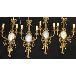 Two pairs of Louis XVI style brass twin branch wall light sconces set with blue Wedgwood Jasper