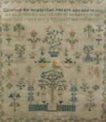 An early Victorian needlework sampler by Harriet Clements depicting Adam and Eve amongst vases of