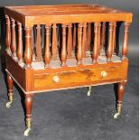 A 19th Century mahogany three section canterbury with sectional baluster spindles above a single