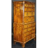 An early 18th Century walnut and feather-banded chest on chest,