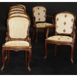 A set of eight French mahogany framed open arm elbow chairs,