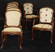 A set of eight French mahogany framed open arm elbow chairs,