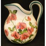 A Wemyss ware "Sweet Pea" pattern water jug bearing impressed and painted mark to base,