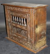 An 18th Century and later wall hanging oak food cupboard,