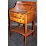 An early 19th Century mahogany side table with three quarter galleried and shelved superstructure