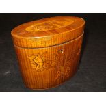 A George III harewood and marquetry inlaid tea caddy of oval form,