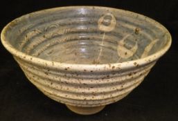 A mid 20th Century studio pottery bowl of ribbed form,