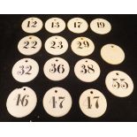 A set of six Farrow & Jackson porcelain wine bin tags of disc form,