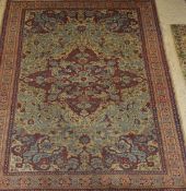 A Persian style rug,