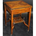 An Edwardian rosewood and inlaid envelope card table,