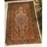 A Persian style carpet,