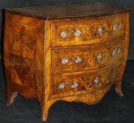 An 18th Century Dutch walnut commode of serpentine fronted bombé form,