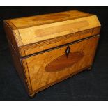A 19th Century maple tea caddy with cross-banded and banded with central rosewood discs to the top