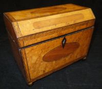A 19th Century maple tea caddy with cross-banded and banded with central rosewood discs to the top