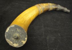 An inscribed cow horn flask, the spout carved with rings and faceted panels,