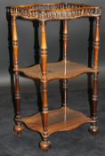 A Victorian rosewood whatnot of small proportions,