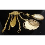 A 19th Century gilt metal chatelaine mounted with oval aide-memoire,