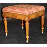 A Victorian walnut dressing stool in the Gothic Revival taste,