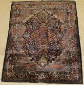 A fine silk Kashan rug,
