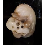 A Chinese carved jade or agate figure of a fish by coral, 3.