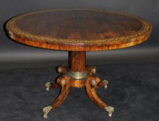 A Regency rosewood and brass inlaid breakfast table,