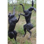 CAROLINE WALLACE (20TH CENTURY) "Boxing hares", hollow bronze, signed,