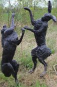 CAROLINE WALLACE (20TH CENTURY) "Boxing hares", hollow bronze, signed,