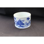 A Chinese Kang Xi period blue and white cylindrical brush pot with slightly waisted sides to the