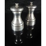 A pair of modern Asprey peppermills of typical form (by Asprey & Co.