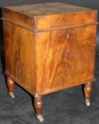 A 19th Century mahogany wine cooler of plain square form,