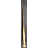 A 19th Century rhino horn walking stick with yellow metal foliate engraved band, 88 cm long, 449.