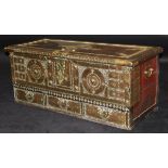 A 19th Century teak zanzibar chest, the top with brass studded decoration and brass plate edging,